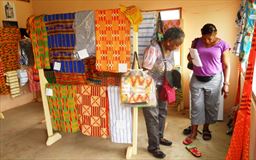 Easy track guests at a kente shop